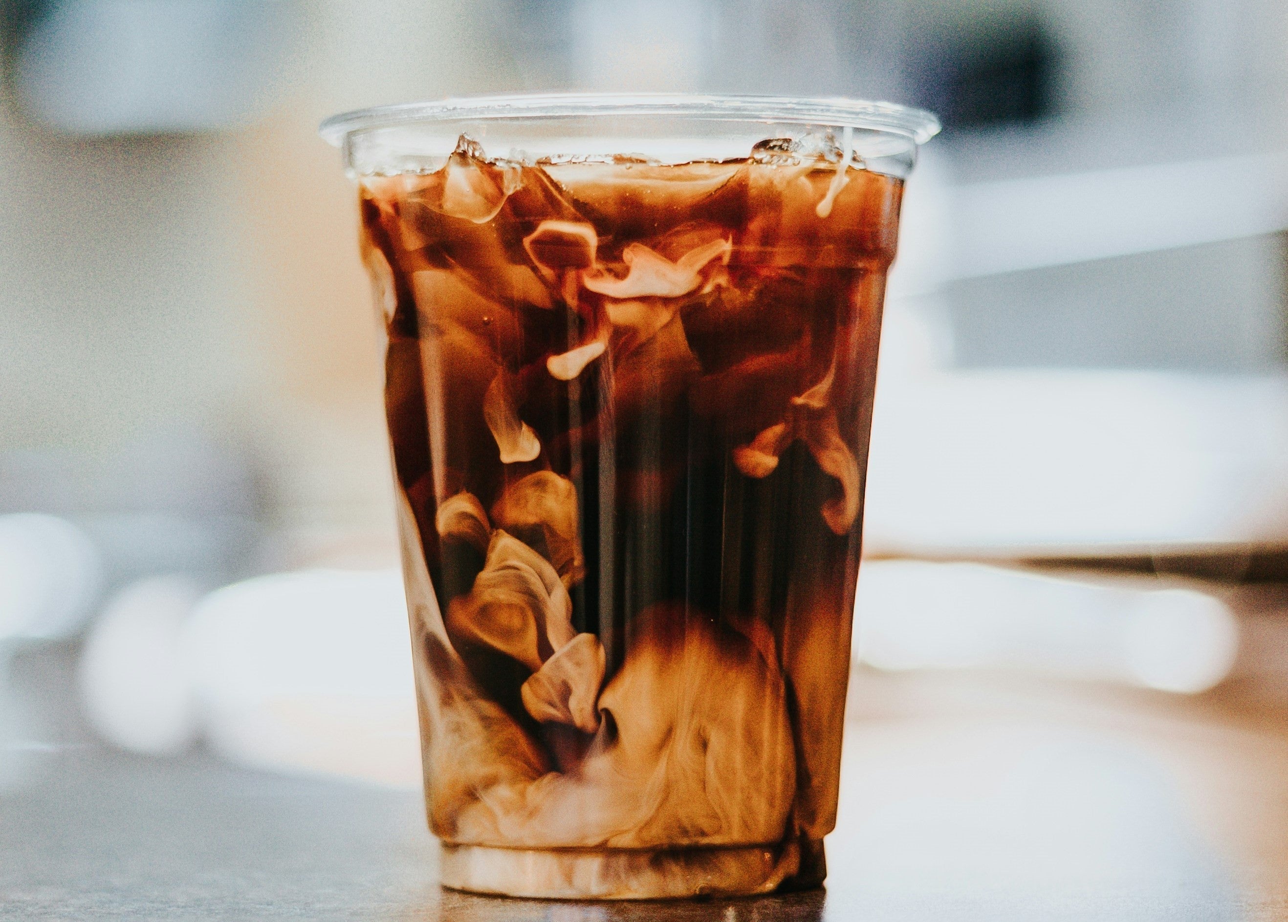 Aesthetic iced coffee in a cup